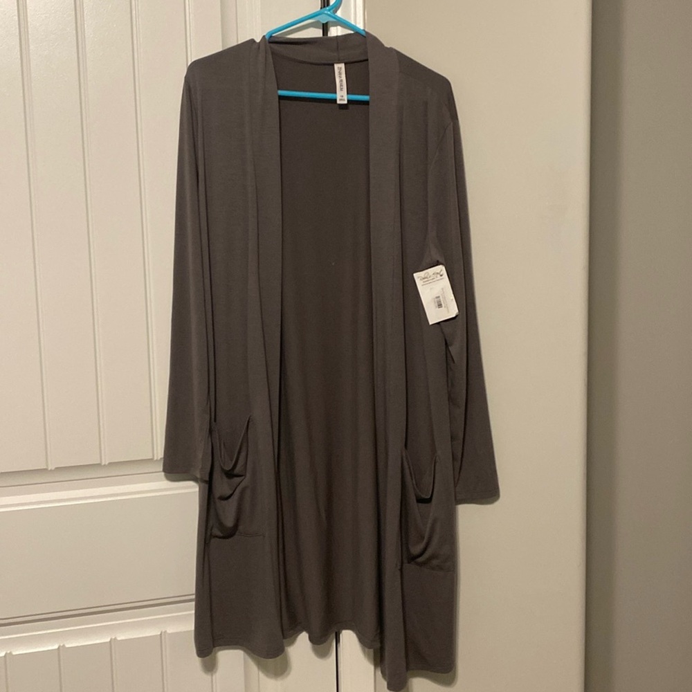 Grey cardigan. Never worn. New with tags. Size 1X.
